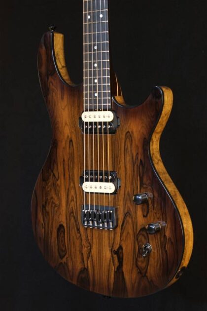 Helix Super Strat.   Ziricote top/Black Limba body. Wenge neck.